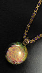 Fashion chainmail necklace with hand blown glass pendant.
