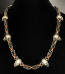 Chainmail necklace with skulls